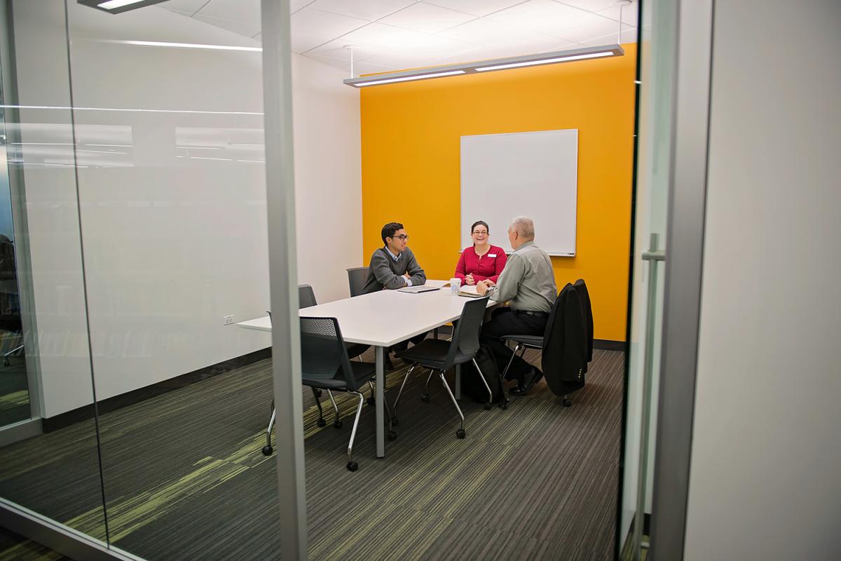 Study Room D interior with conference table and whiteboard